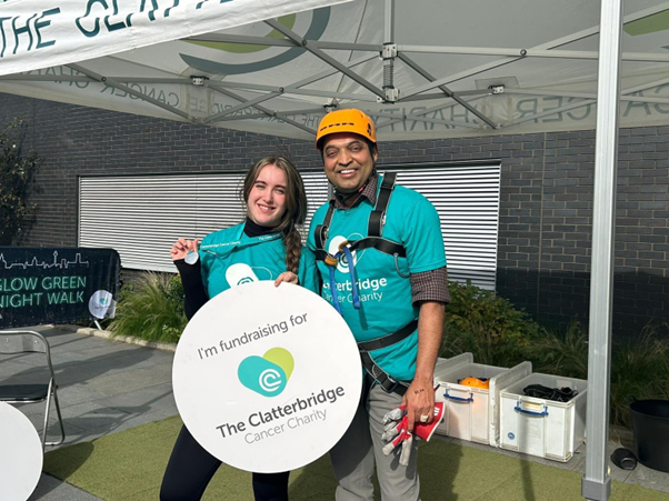 Photograph of Grace Walker, Clatterbridge Private Clinic Receptionist, and Dr Ray Sripadam, Consultant, after taking part in the Clatterbidge Charity Abseil 2024. 