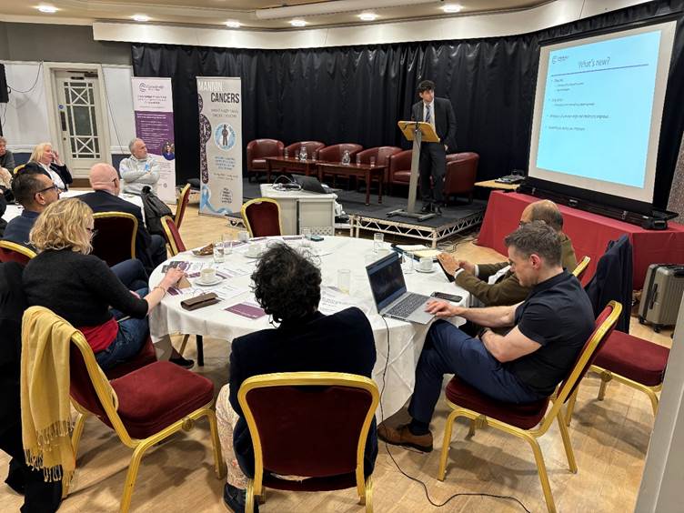 A photograph of the 'Meet the Clatterbridge Private Consultants' event in the Isle of Man, Dr Johnny Heseltine is giving a talk on Thoracic and Cancer of Unknown Primary 