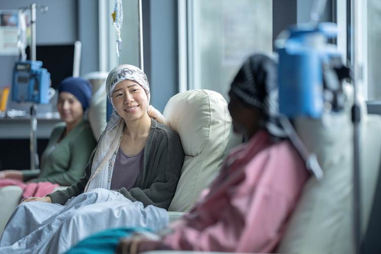 A picture of several women receiving chemotherapy 