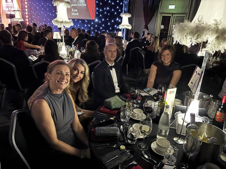 The Clatterbridge Private Clinic team sat at their table at the Clatterbridge Cancer Charity Annual ball. 
